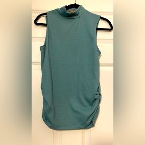 Teal green sleeveless mock neck top